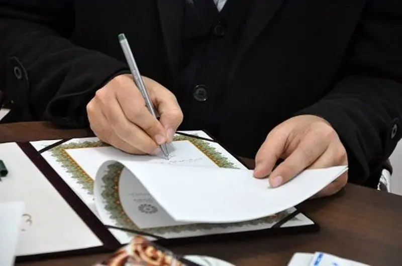 کشتیرانی جمهوری اسلامی و بانک تجارت تفاهم‌نامه بانکی امضا کردند