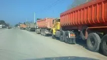 روستای یک توت در چنبره کامیون‌ها