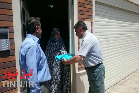 هدیه قرآن عمران اریکه به همسایگان محدوده ساخت متری خط 6