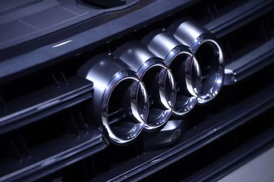 Automakers agree to clean up diesels to avoid ban in German cities