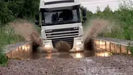 واکنش یک راننده ترانزیت به جاده نامناسب روسیه به قزاقستان+فیلم