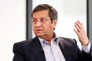 همتی: قیمت دلار بیشتر از این سقوط می‌کند 