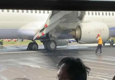 China Airlines Boeing 737 Bursts Both Left Main Tyres on Landing
